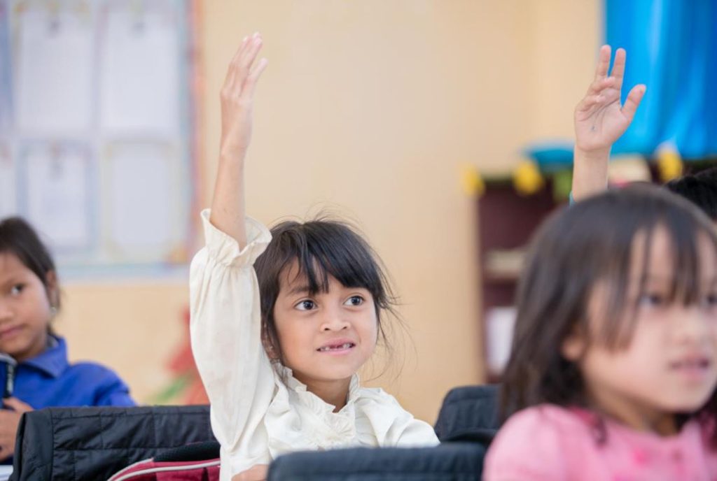 Girl in classroom.