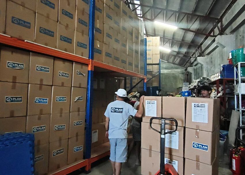 Photograph of warehouse with humanitarian supplies.