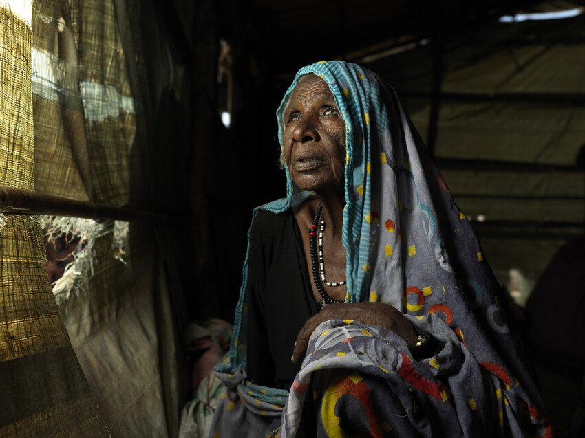 Nyakong Kon, 70, lives in a shelter built by Plan in Renk.