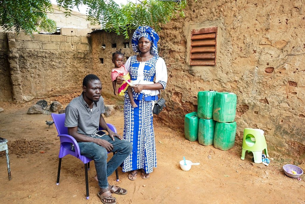 Rihanata with her husband and their youngest daughter. 