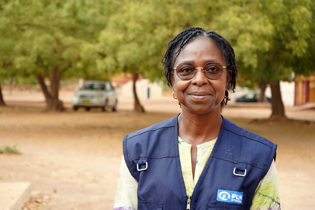 Olivia, Child Protection Advisor at Plan International Burkina Faso, visiting the reception centre where Issa and Abdou live.