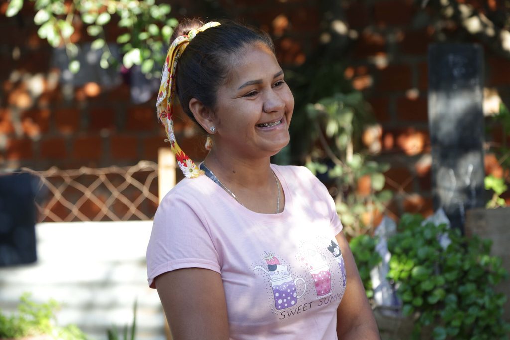 Young entrepreneur smiling.