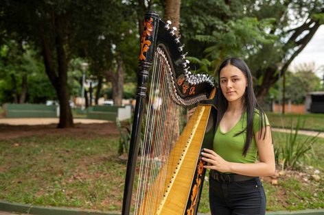 Young paraguayan harpist