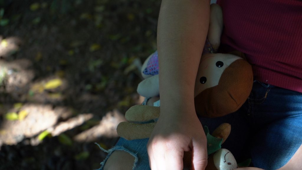 Lili with her daughter's toy.