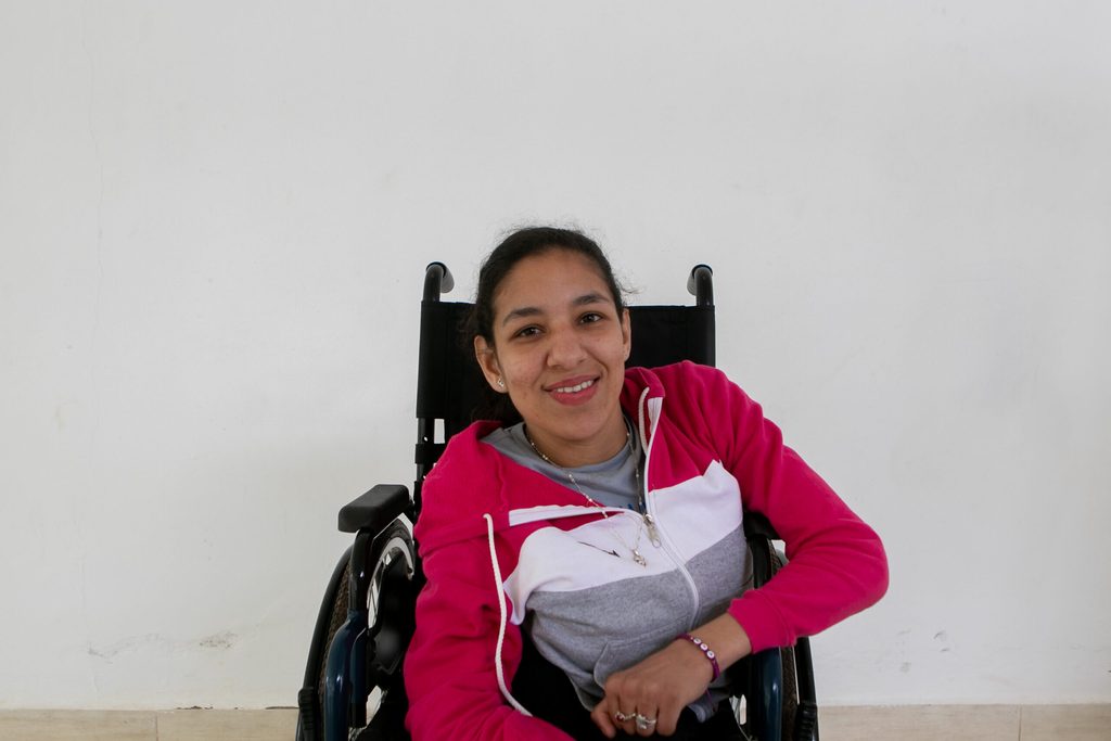 Milagros, young woman in a wheelchair. 