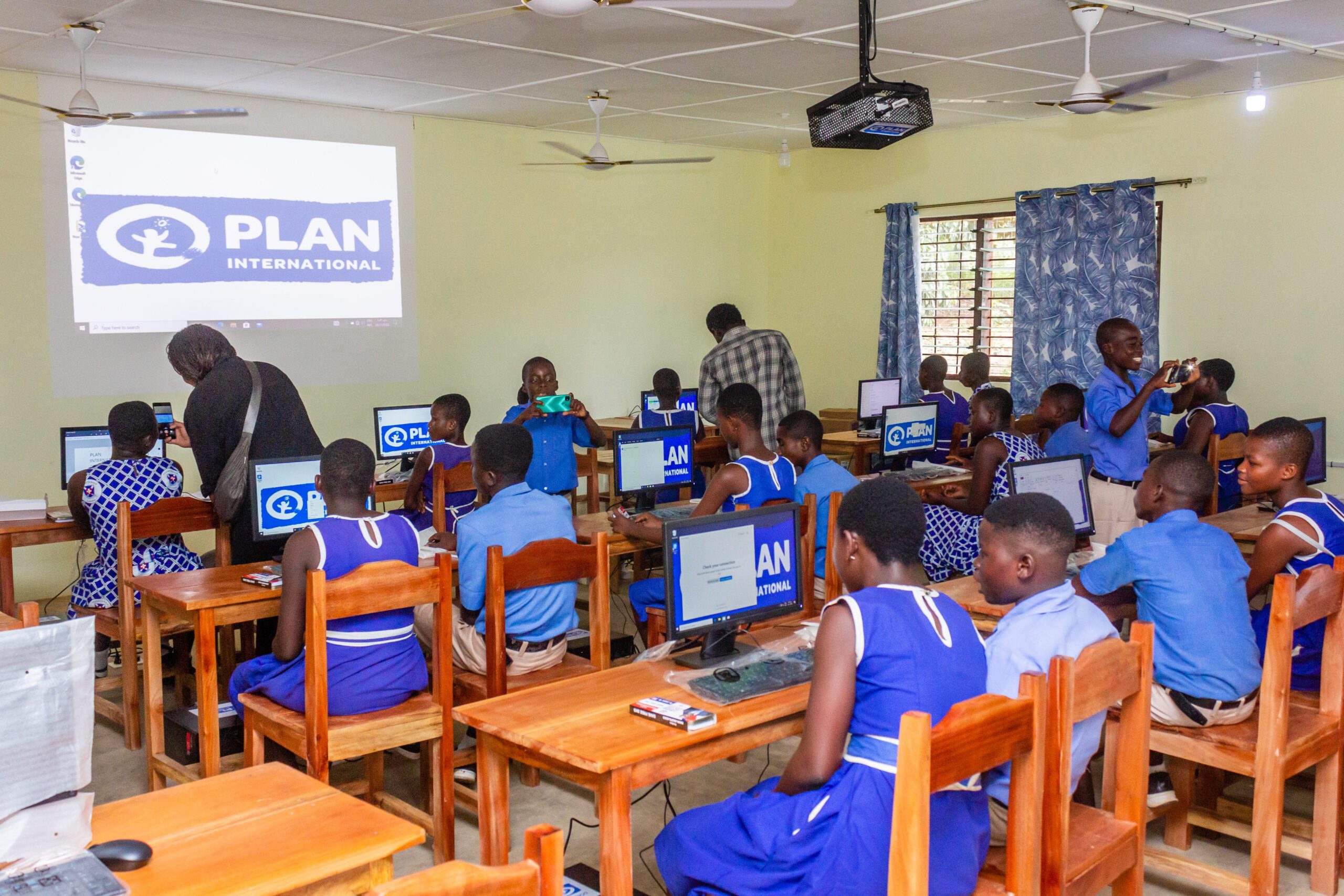 Children using the facilities in the newly built school building