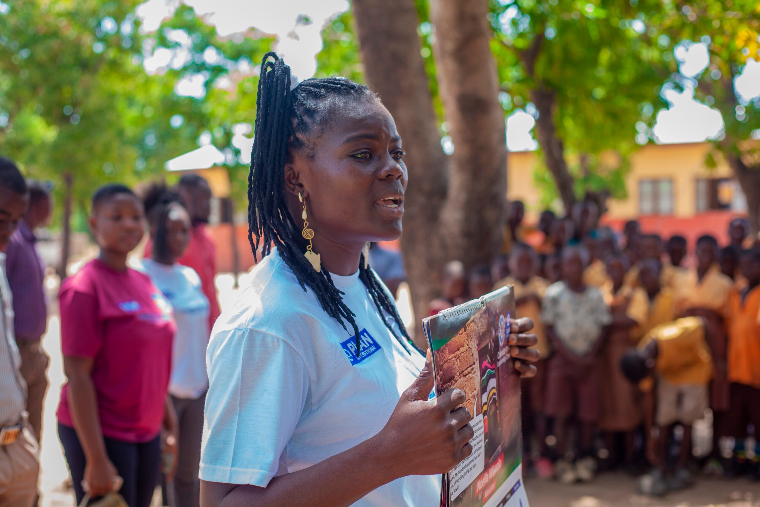 Wiyaala talking with students about the importance of girls' education