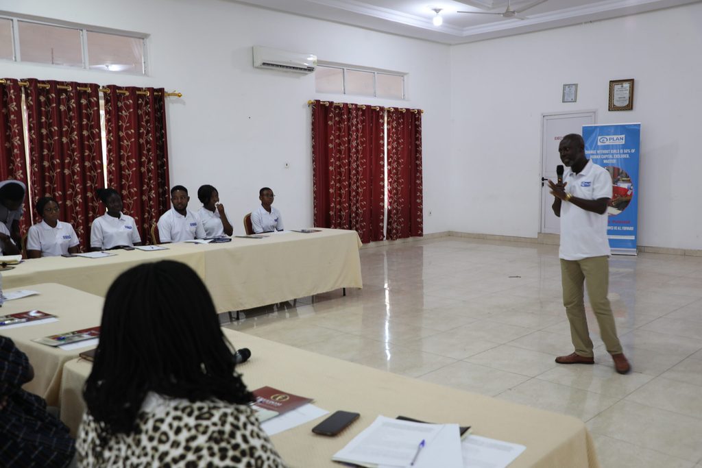 Mr Benjamin A. Boateng, Monitoring and Evaluation Coordinator at Plan International Ghana giving a speech at the event