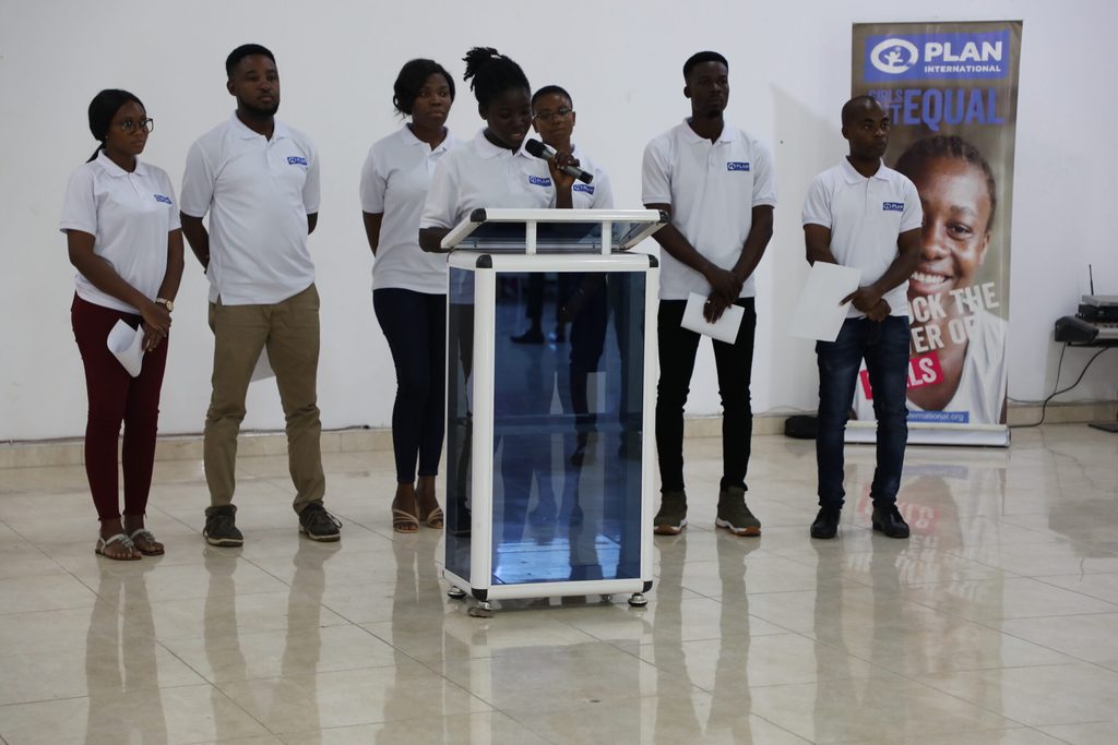 YAP members speaking at the event to induct them into their roles at Plan International Ghana