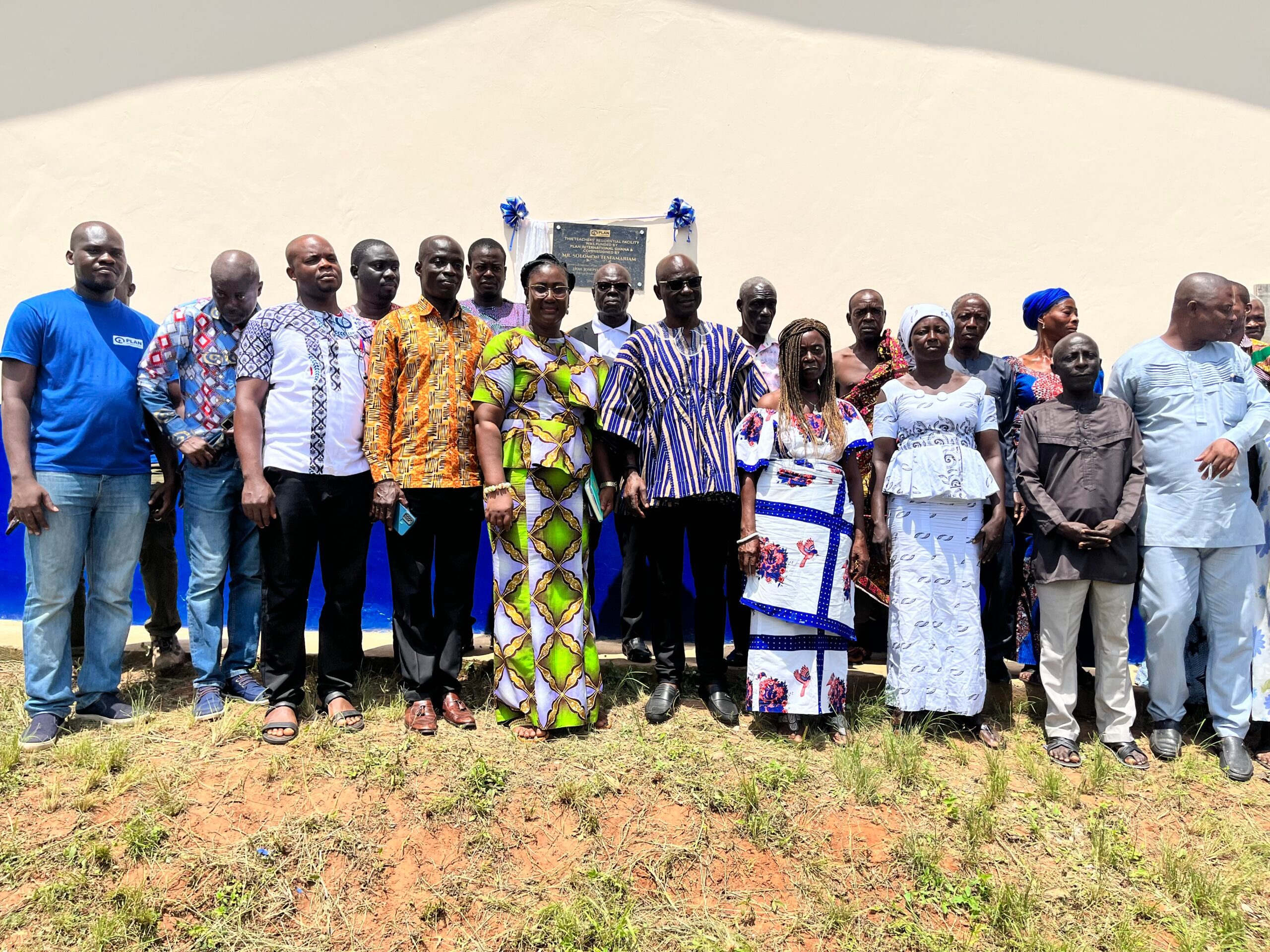 People celebrate at the event to open the teachers' accomodation in rural Ghana