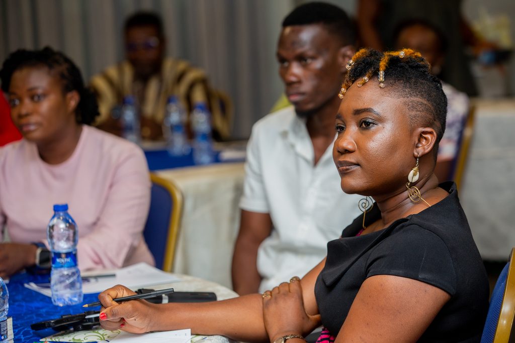 Participants listening attentively.