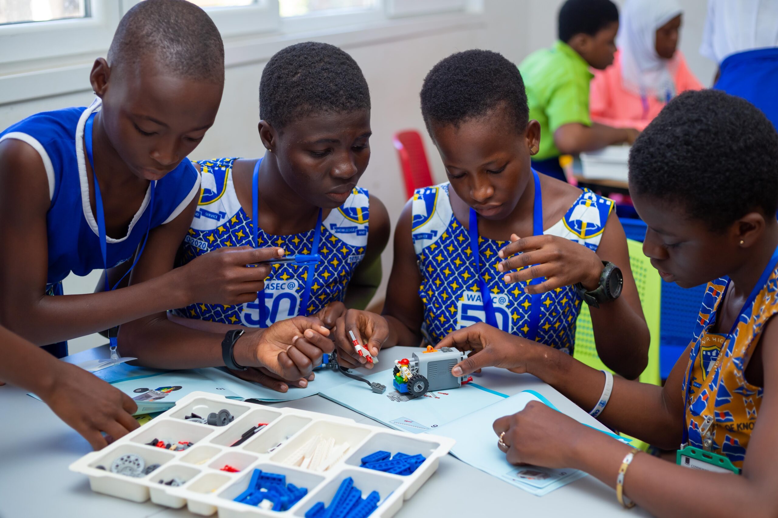 Girls building a robot