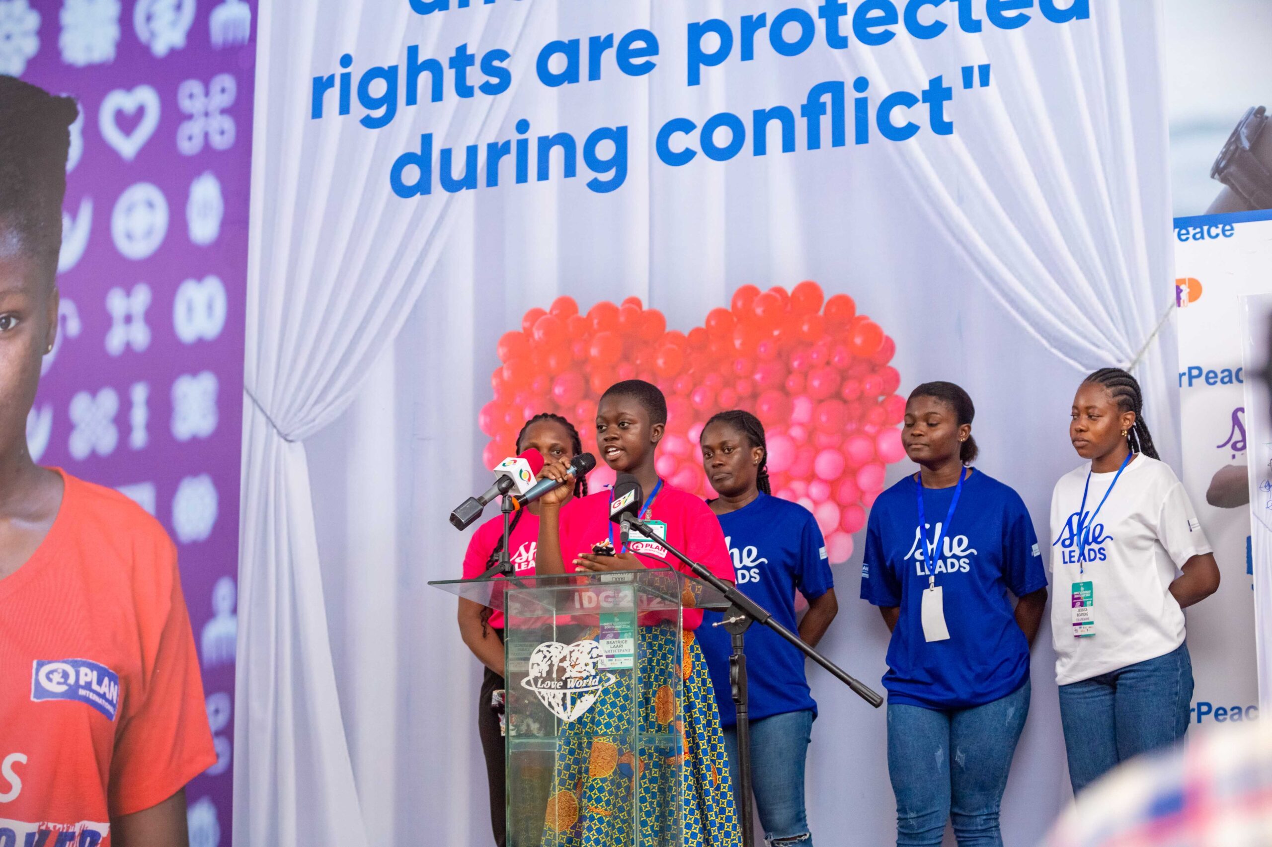 Beatrice a programme participant delivering a heartfelt speech.