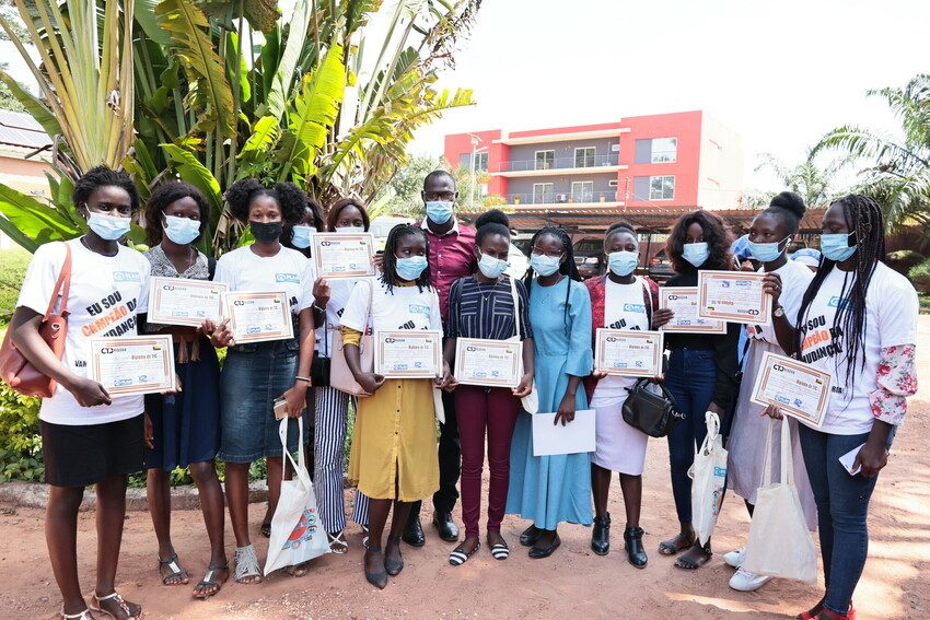 Girls receiving their skills training certificates. 