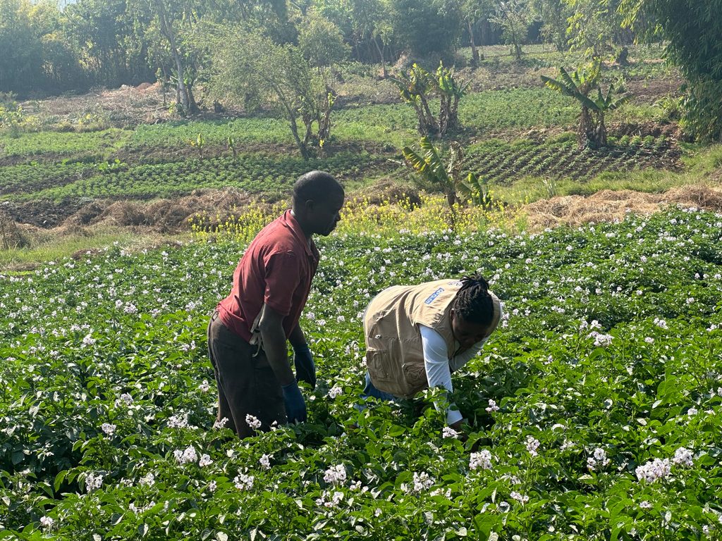 Bridget with one of the farmers at the camp