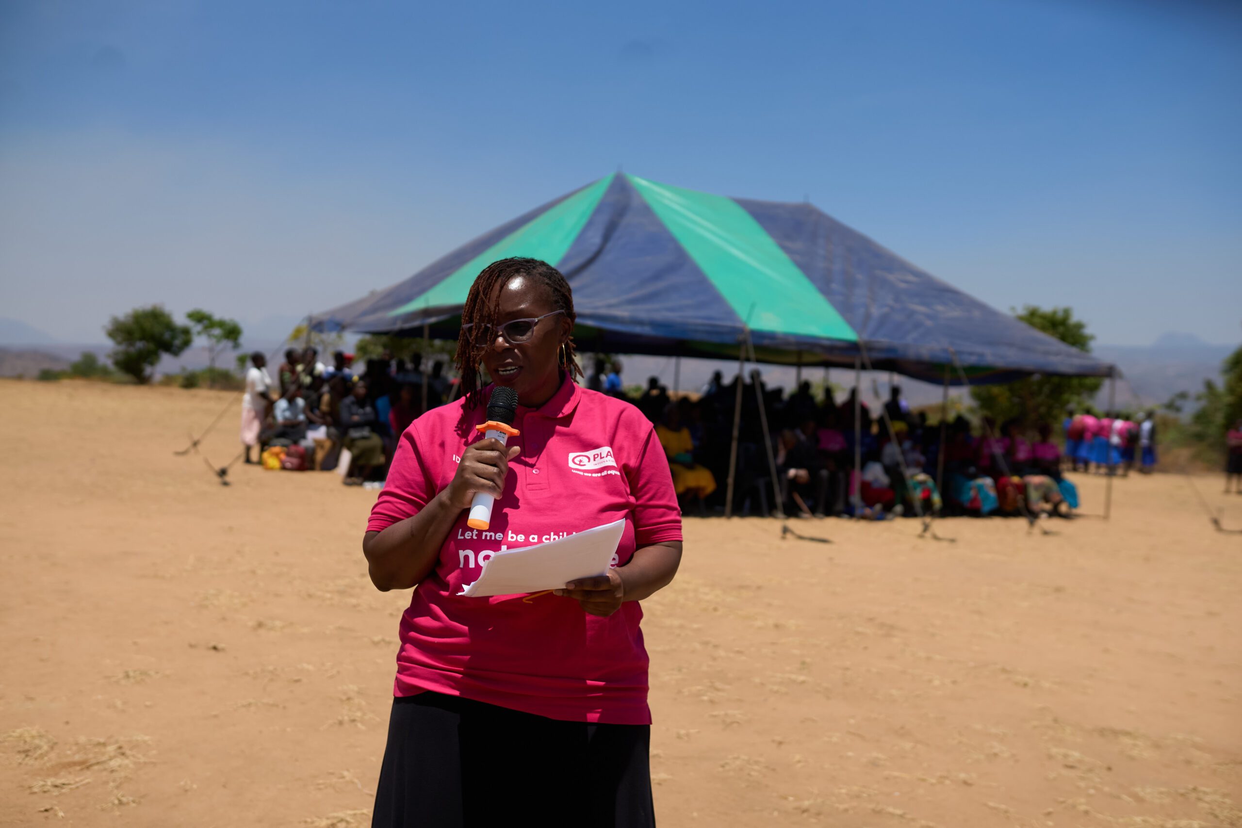 Mwape Mulumbi Plan Malawi Country Director, making her remarks