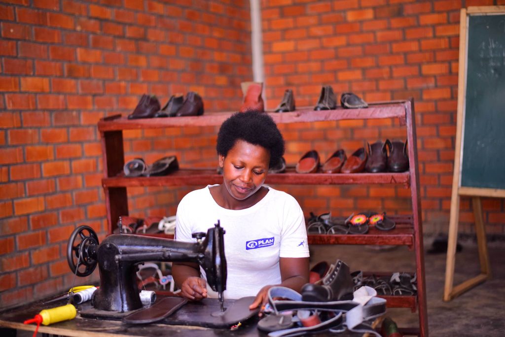 Christine working at her shoe maker. 