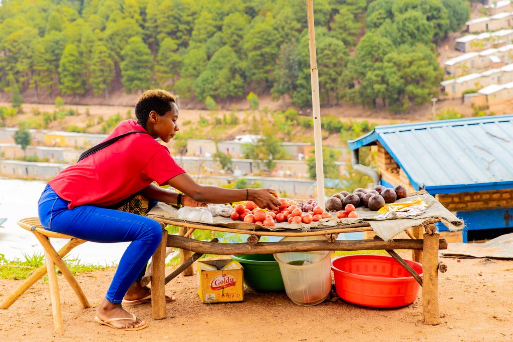 Agnes setting up her vegetable stall.