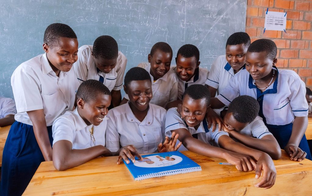 Esther and her clubmates convening in their school's SRHR club.