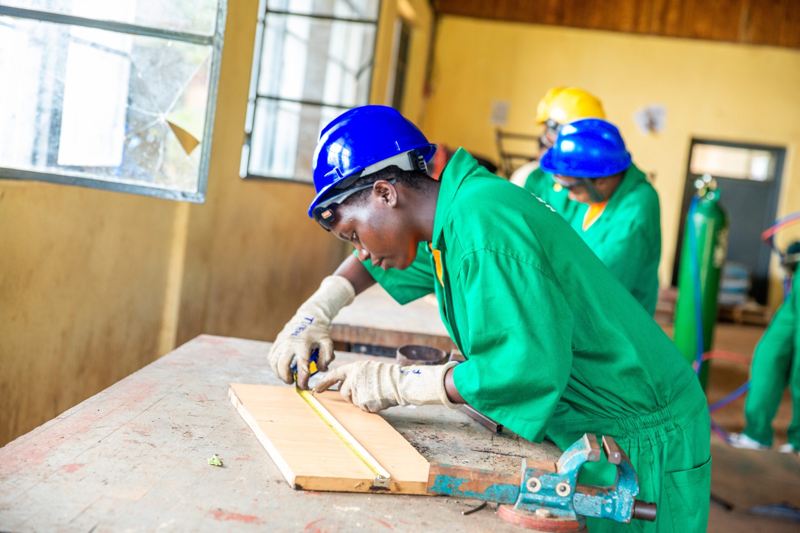 A girl from the project participating in welding training. 
