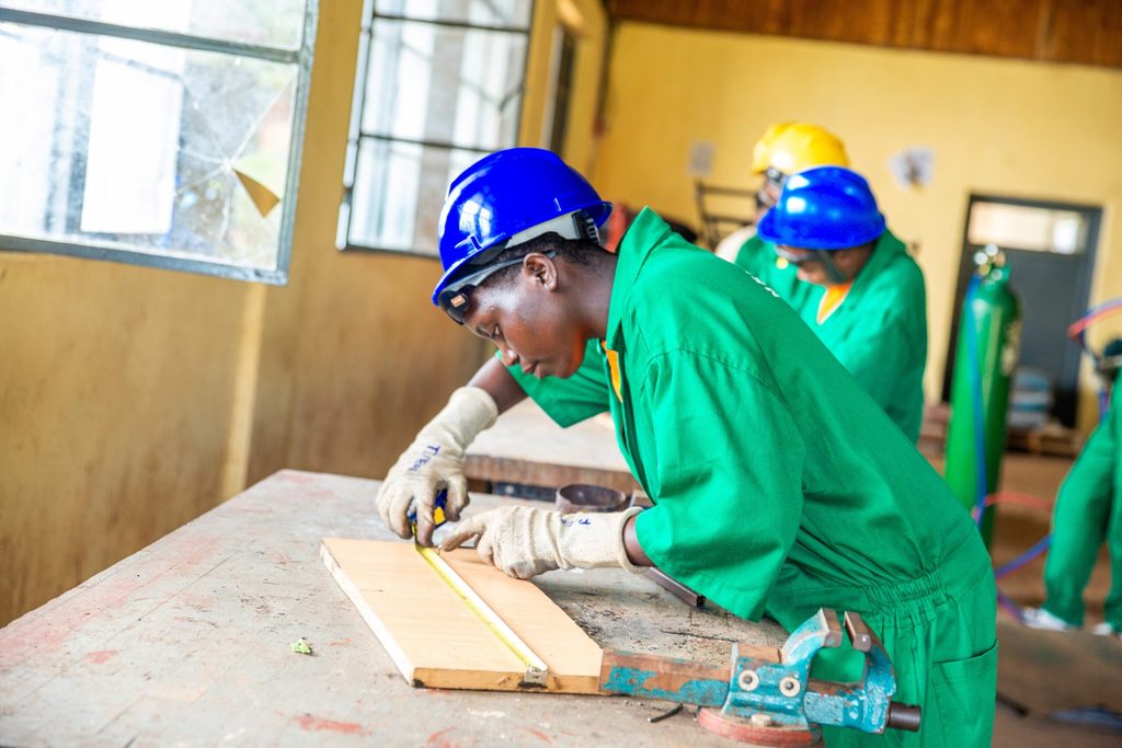 A girl from the project participating in welding training.