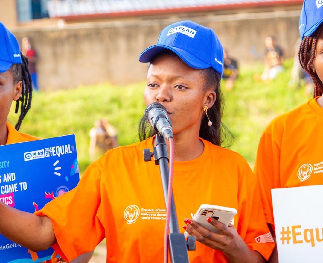 Joselyne reading her poem about girls’ rights protection.