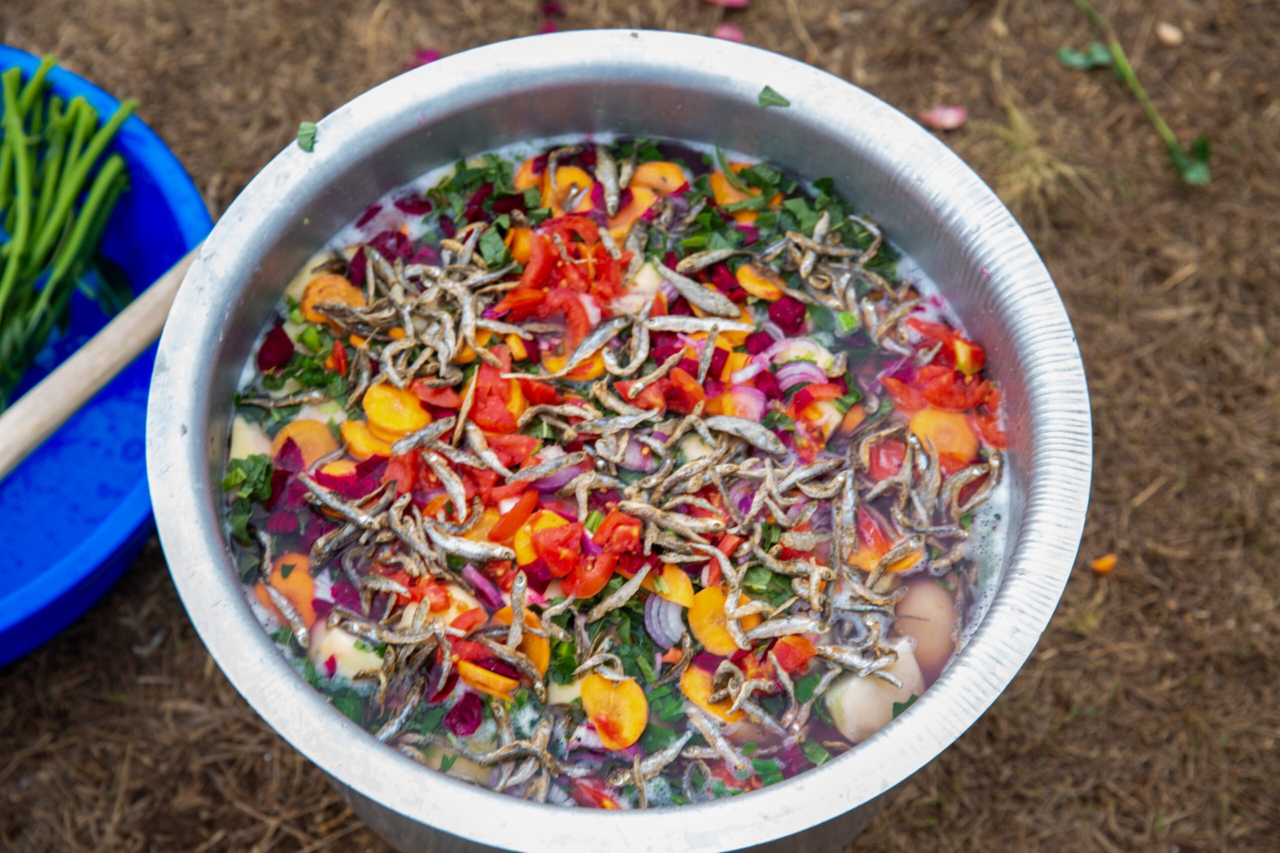 A bowl of food containing a range of nutritious ingredients.