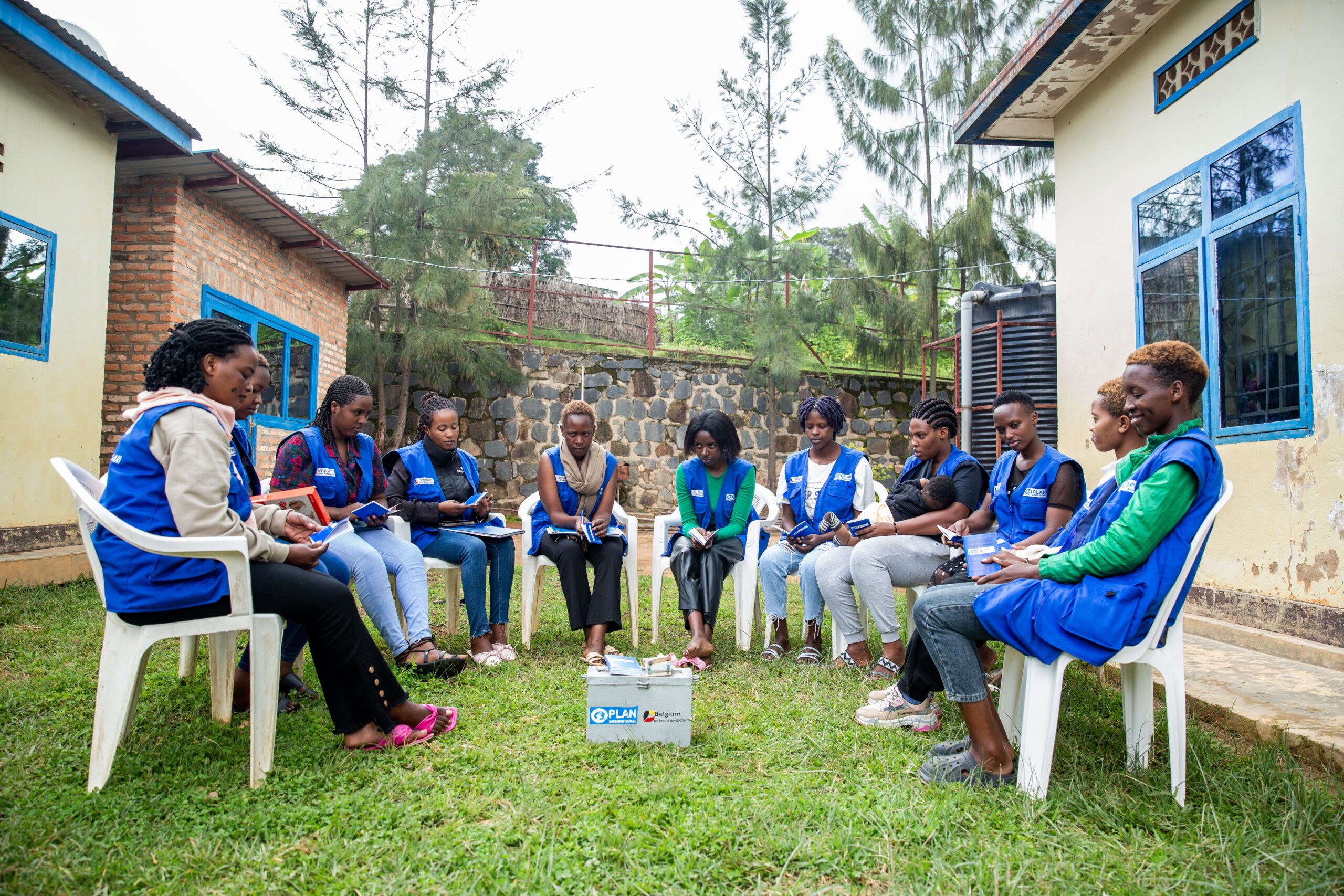 ‘Tuganire Mwali’ mentors meeting during their savings group session.