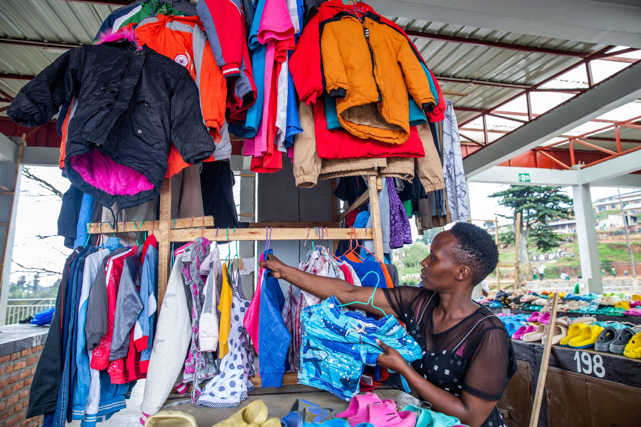 Nadia sells clothes at the local market.