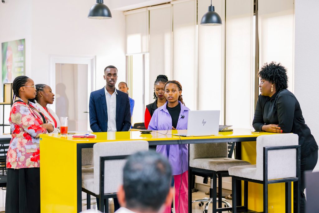 A panel member speaking to staff about her aspirations.