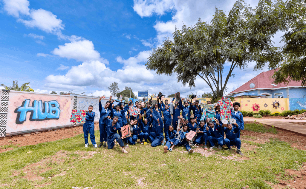Vocational training participants posing for a group photo.