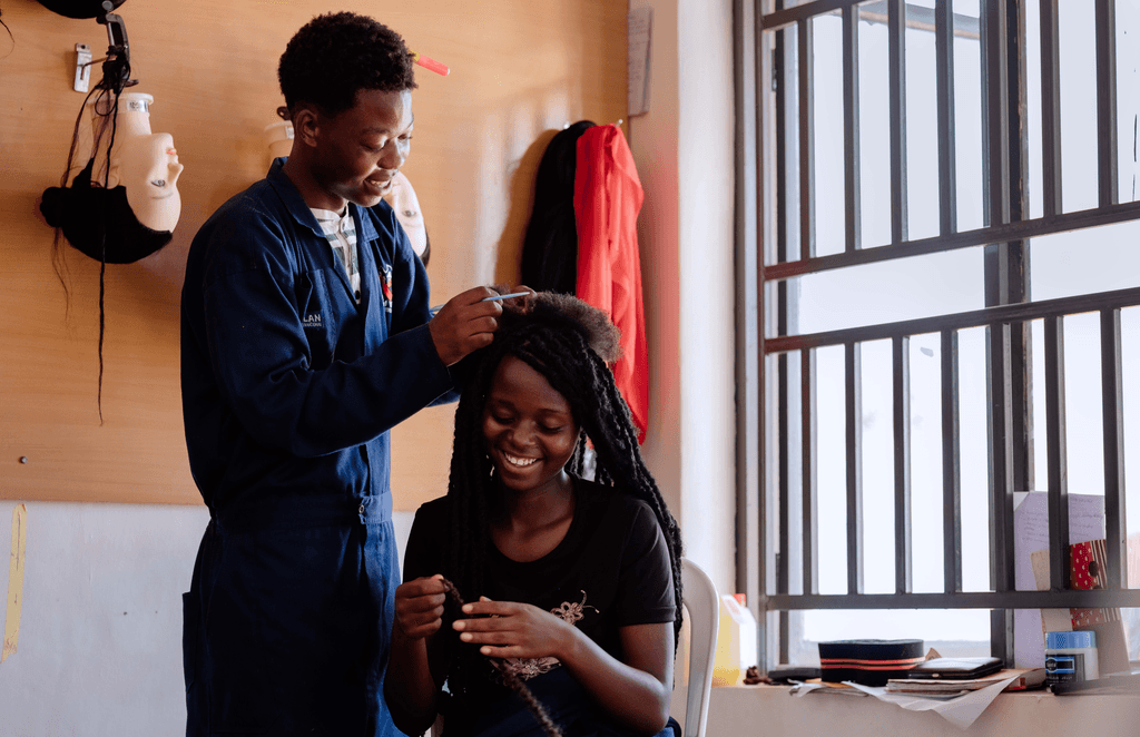 Yassin during a training session in women’s hairdressing.