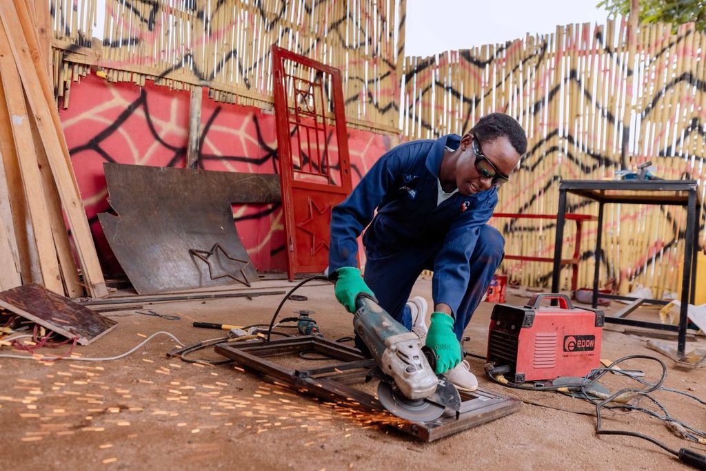 Yassin earns a living through welding.