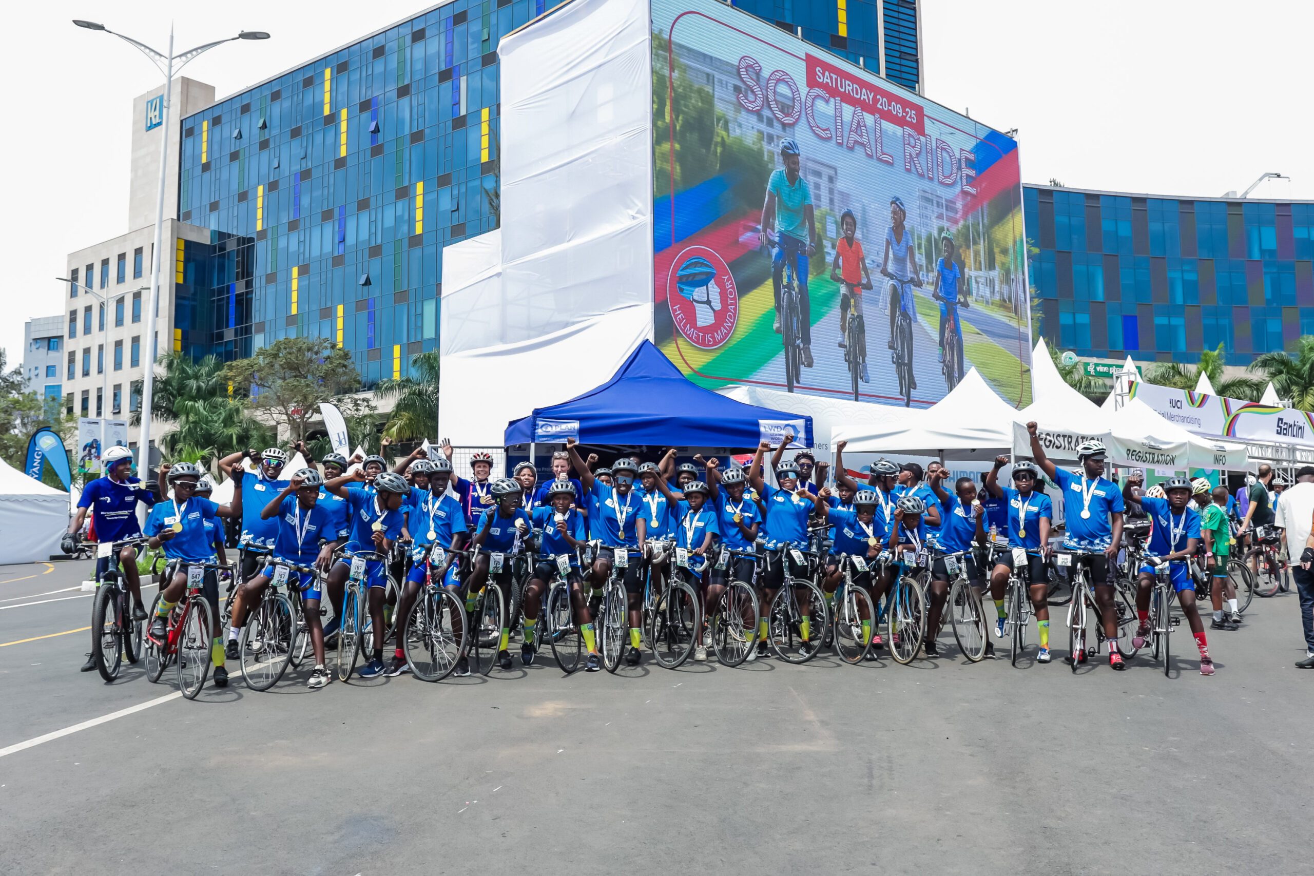 Plan International Rwanda, partners, and the Bike for Future team gather for a group photo.