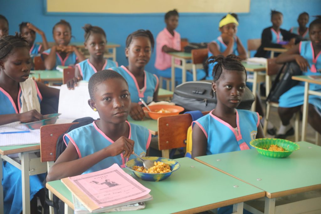 Haja eating a meal at school