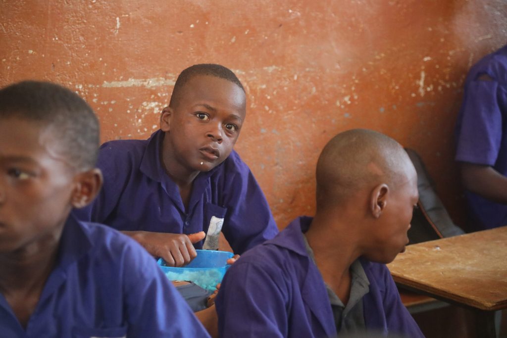 Ola enjoying a meal at school