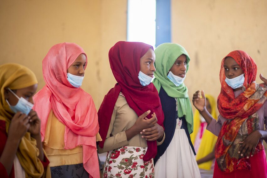 Girls' club members learning about the dangers of FGM