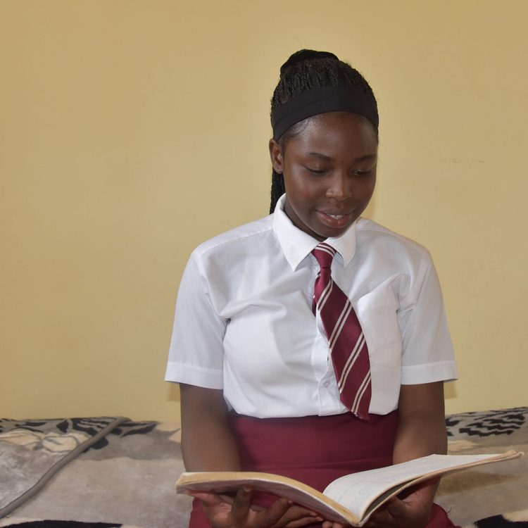 A girl in one of the Plan International-supported boarding facilities