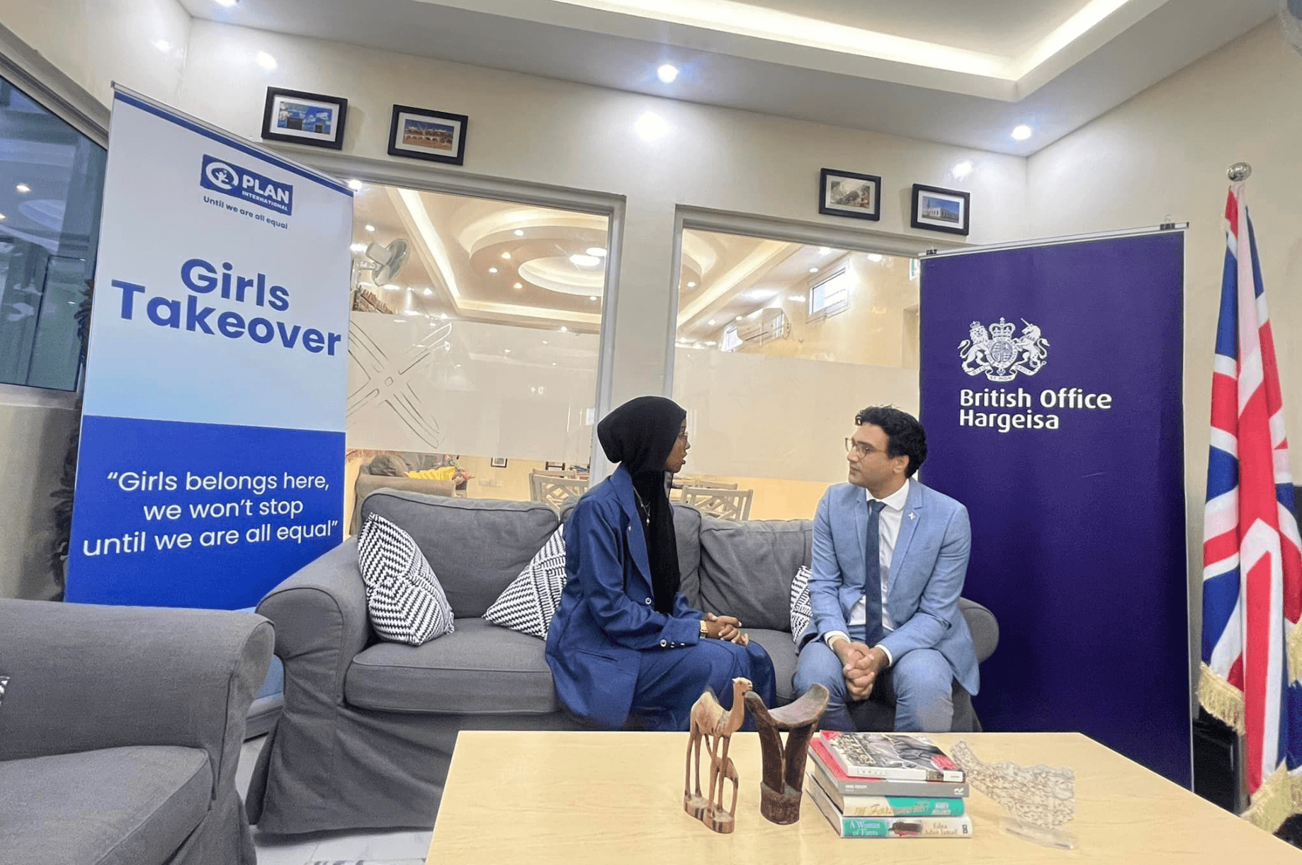 Young activist from Hargeisa talking to British office official during recent International Day of the Girl #GirlsTakeover