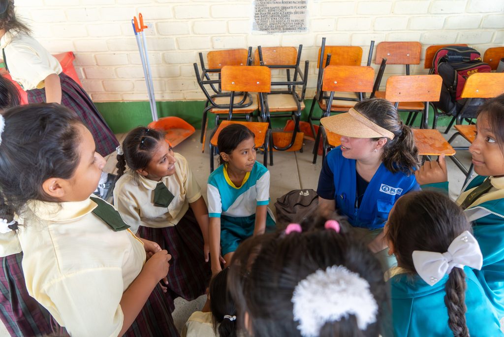 Children take part in Plan of Joy learning activity at school in Piura