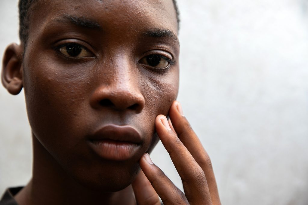 Junior*, 16, once living a stable life with his mother, going to school and eating regularly.