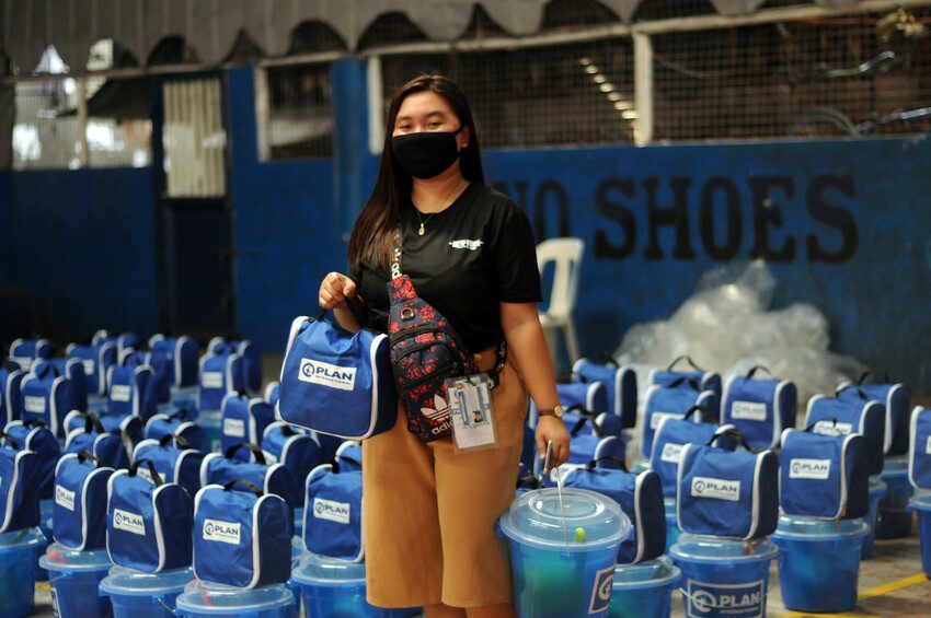 Richelle, 18, helps distribute menstrual hygiene kits 