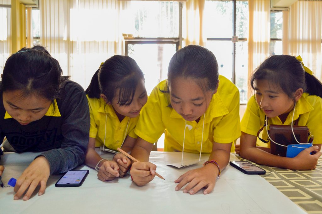 Girls discussing about sexual reproductive health in a workshop