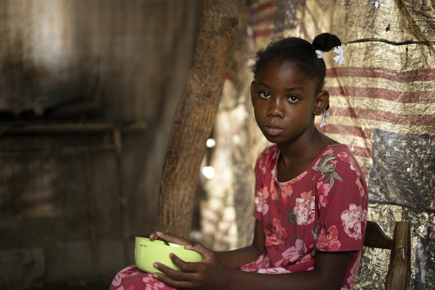 Lettycia, 10, eating a meal at home