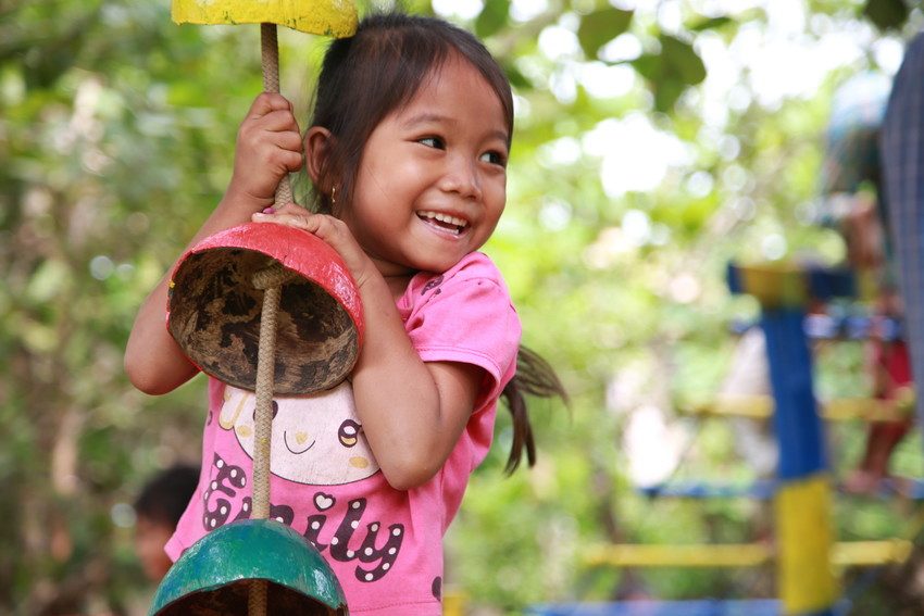 Indigenous preschool girl has fun playing at ECCD centre in Cambodia