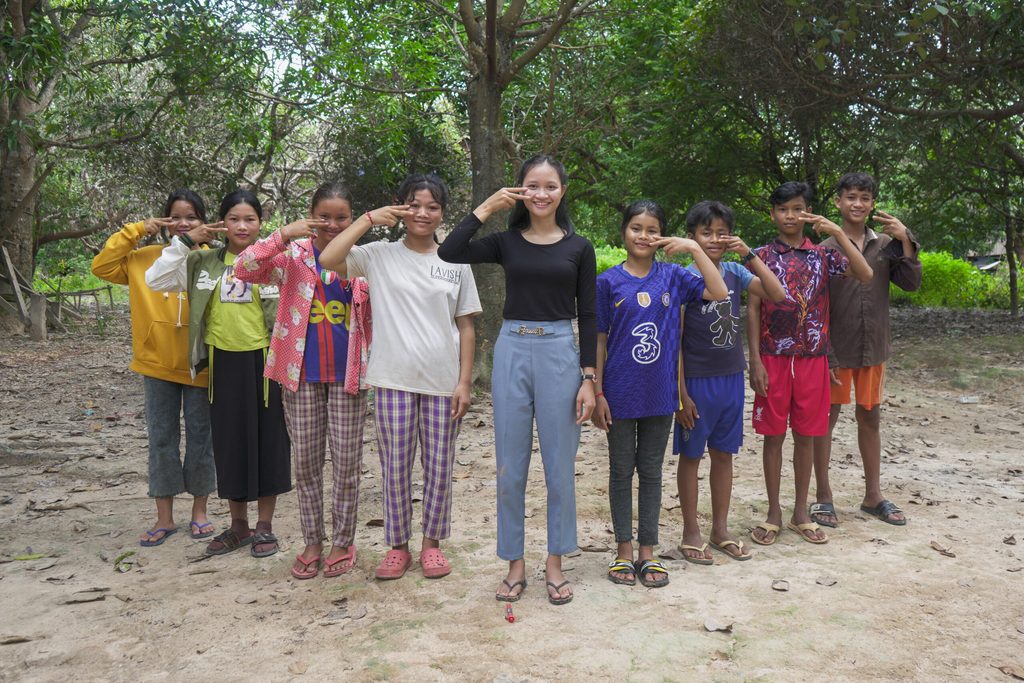 Children in Cambodia supporting the Girls Get Equal campaign