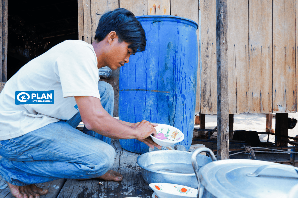 Pen doing household chores at home in Ratanak Kiri Province
