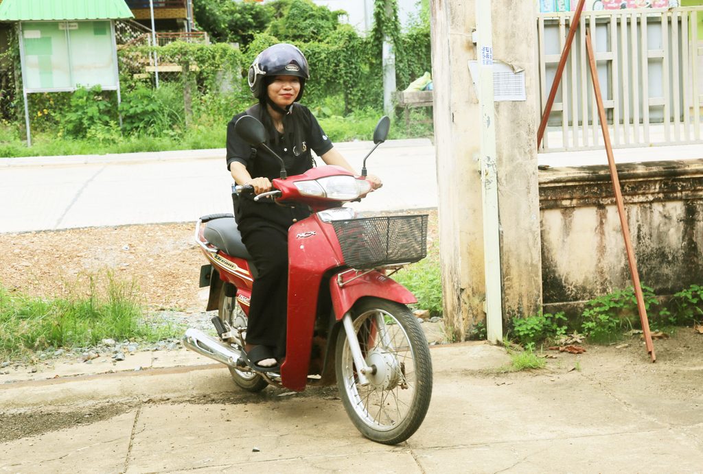 Kann is on her scooter back from doing her field work.