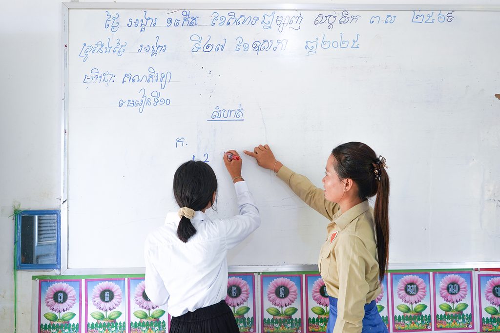 Her teacher is teaching her during break.