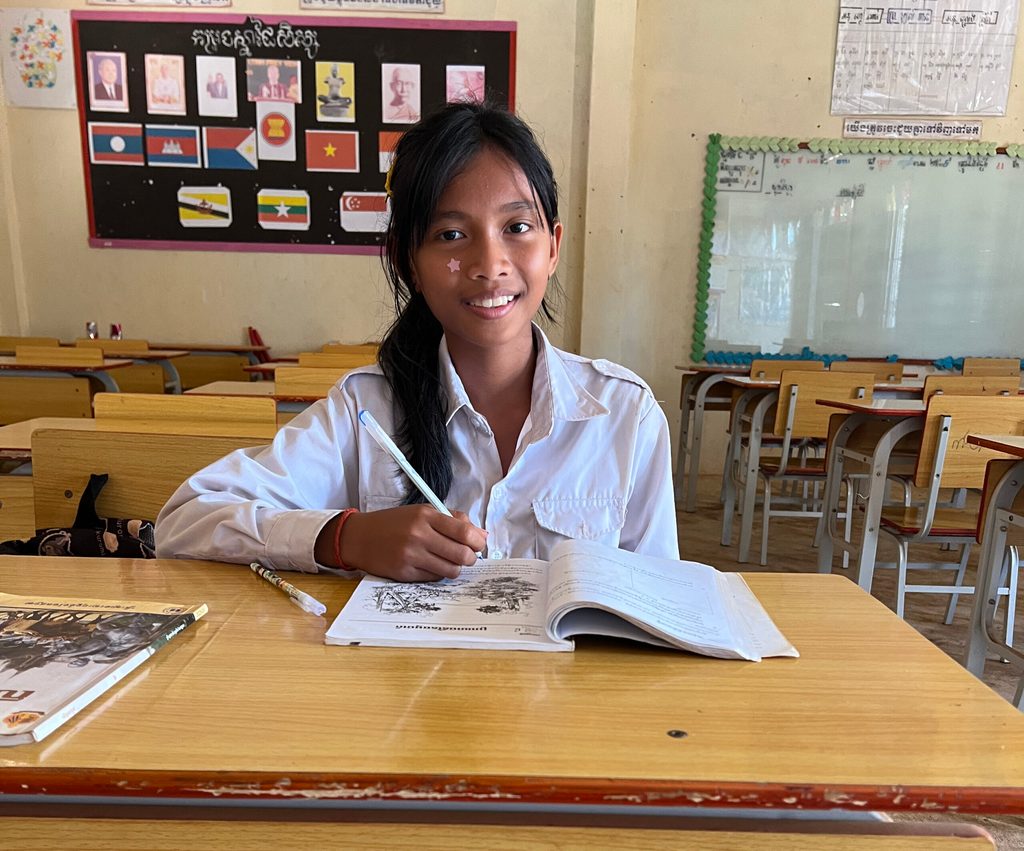 Sonita is studying in class